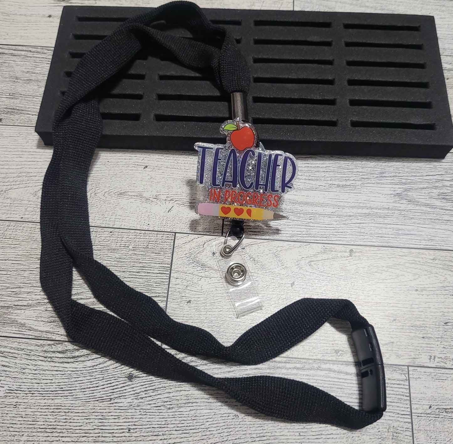 Teacher in progress badge reel